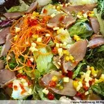 Aromatic Crispy Smoked Duck Salad (Served with Mixed Greens, Red Onions Rings, Vine Tomatoes, Red Radish & Sjora Mango Chili Dressing)