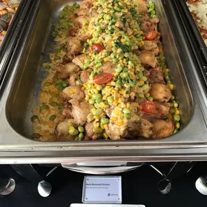 Herb-Roasted Chicken <i> with edamame and corn ragù </i>