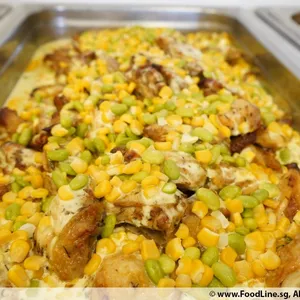 Herb-Roasted Chicken <i> with edamame and corn ragù </i>