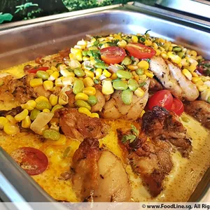 Herb-Roasted Chicken <i> with edamame and corn ragù </i>