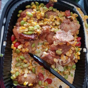 Herb-Roasted Chicken <i> with edamame and corn ragù </i>