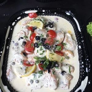 Oven-Baked Sutchi Fillet <i>with caper butter sauce</i>