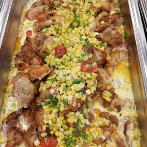 Herb-Roasted Chicken <i> with edamame and corn ragù</i>