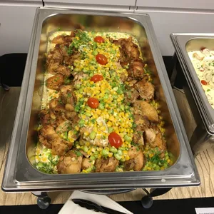Herb-Roasted Chicken <i> with edamame and corn ragù</i>