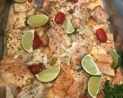 Baked Salmon with Rosemary infused Lemon-Butter sauce | Customer Photo | Spark and Flame Catering (The Flame Cafe N Spark Restaurant)