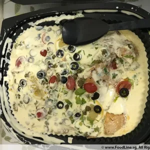 Oven-Baked Sutchi Fillet <i>with caper butter sauce</i>