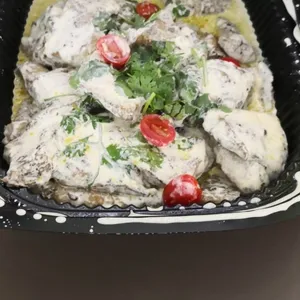 Coriander Pesto Dory <i>in light butter sauce with cucumber salad</i>