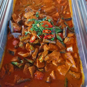 Poached Toman in Laksa Gravy (Spicy) <i>with braised tau pok and traditional fish cake</i>