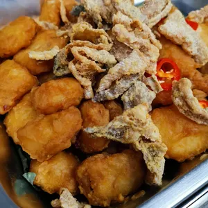 Golden Salted Egg Hoki Fish <i>topped with crispy fish skin</i>