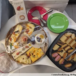 Assortment of French Eclairs & Homemade Sliced Cakes
