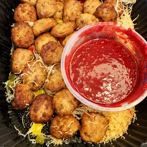 Duck Confit Meatballs <i>with fresh cranberry compote</i>