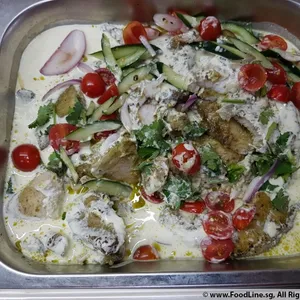 Coriander Pesto Dory <i>in light butter sauce with cucumber salad</i>