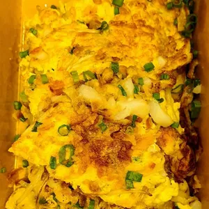 Carrot Cake Fried with Prawns, Chives and Beansprouts