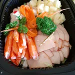 Christmas Cold Cuts <i> (Sliced roasted turkey, honey baked ham, crabstick garnished with pineapple pickles) </i>