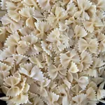 Farfalle with Italian Basil Pesto Cream Sauce<br>
<i>Olives, Sundried Tomatoes, Melange of Tomatoes</i>