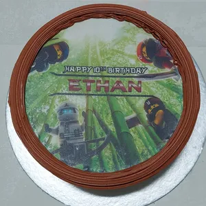 Ninjago Celebrates (Size: 7 inch) (Flavours: Chocolate) (Big candles: 2) (Small candles: None) (Message on Complimentary Gift Card: No) (Message on Cake (Short & Sweet): Yes (do write the message in the ordering form, under comments box))