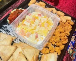 Prosperity Fortune Platter (Octopus, Spring Roll, Salad Prawn, Golden Chicken,  Golden Money Bag) 拼盘（章鱼，春卷，黄金钱袋，沙律虾，黄金鸡） | Customer Photo | Xin Yi Pin Catering Pte Ltd