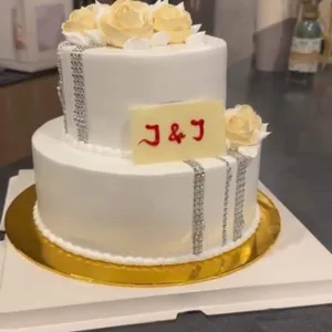 JFF10 Beauty in White (Size: Size: 9 inch bottom, 6 inch top) (Top Layer Flavour: Cookies & Cream) (Bottom Layer Flavour: Black Forest) (Eggless: No) (Big Candles: 5) (Small Candles: 5) (Message on Cake (Short & Sweet): Yes (do write the message in the ordering form, under comments box)) (Message on Complimentary Gift Card: Yes (do write the message in the ordering form, under comments box))