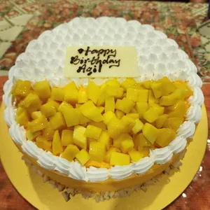 Mighty Mango (Size: 9 Inch) (Big Candles: 2) (Small Candles: 5) (Message on Cake (Short & Sweet): Yes (do write the message in the ordering form, under comments box)) (Message on Complimentary Gift Card: Yes (do write the message in the ordering form, under comments box))