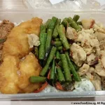 Packed meals are served with Steamed White Rice