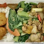 Packed meals are served with Steamed White Rice