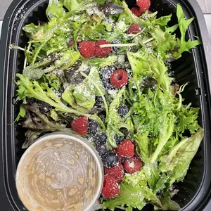 Mixed Green Salads<br>with Assortment of Berries and Trio Dressings