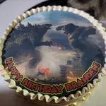 Godzilla Vs Kong (Size: 9 inch) (Flavours: Chocolate) (Big candles: 1) (Small candles: 8) (Message on Complimentary Gift Card: Yes (do write the message in the ordering form, under comments box)) (Message on Cake (Short & Sweet): Yes (do write the message in the ordering form, under comments box))