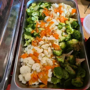Seasonal Vegetables with Garlic Butter Sauce & Almond Flake