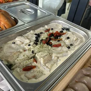 Tuscan Garlic Cream White Fish<br> Traditional garlic cream sauce, baked white fish, roasted tomatoes