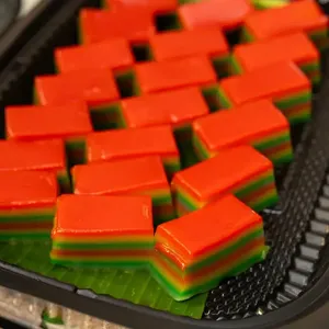 9 Layer Rainbow Kueh<br>traditionally made at our top secret nyonya kitchen