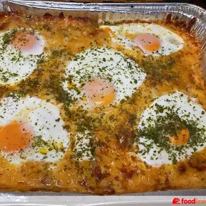 Oven Baked Shakshouka(V)<br>  sauteed garlic spinach, romesco sauce, egg, parmesan cheese shred