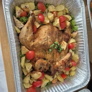 Herb-Roasted Whole Chicken with Baked Potatoes & Tomatoes
