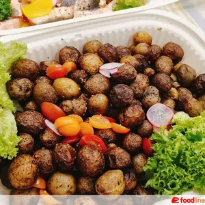 Crushed Baby Potatoes with Seasonal Vegetables Infused with Garlic & Rosemary