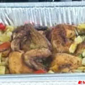 Herb-Roasted Whole Chicken with Baked Potatoes & Tomatoes