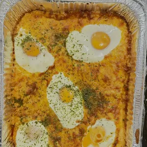 Oven Baked Shakshouka(V)<br>  sauteed garlic spinach, romesco sauce, egg, parmesan cheese shred