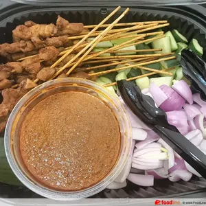 Singapore-Styled Chicken Satay<br>peanut sauce, raw onion, cucumber<br>spicy, contains allium, nuts