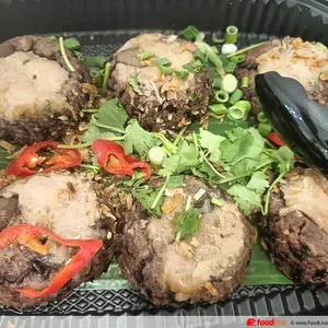 Purple Rice Loh Mai Kai <br> purple rice, chicken, chestnuts <br> Contains allium, wheat, soy and shellfish