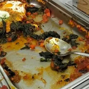 Oven Baked Shakshouka(V)<br>  sauteed garlic spinach, romesco sauce, egg, parmesan cheese shred