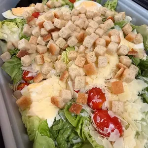 Egg and Parmesan Caesar Salad (V)<br>housemade dressing, cherry tomato, crouton