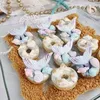 Click to see more photos of Mini Mermaid Cake Donuts – Box of 10