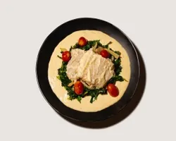 Tuscan Garlic Cream White Fish <br> traditional garlic cream sauce, baked white fish, roasted tomatoes <br> Contains dairy and allium, Pescatarian | Customer Photo | Grain