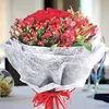 Click to see more photos of RR005: 12 Red Roses with Astromelia Handbouquet