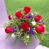 Click to see more photos of RR024: 12 Red Roses All-Round Table Arrangement