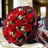 Click to see more photos of RR042: 12 Red Roses Paper Wrapper Hand Bouquet